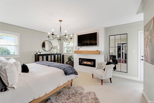 119 Southridge Dr, Fort Wayne, IN 46825 - carpeted bedroom featuring baseboards, a fireplace, and a chandelier