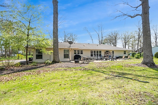 119 Southridge Dr, Fort Wayne, IN 46825 - rear view of house with a yard and a patio