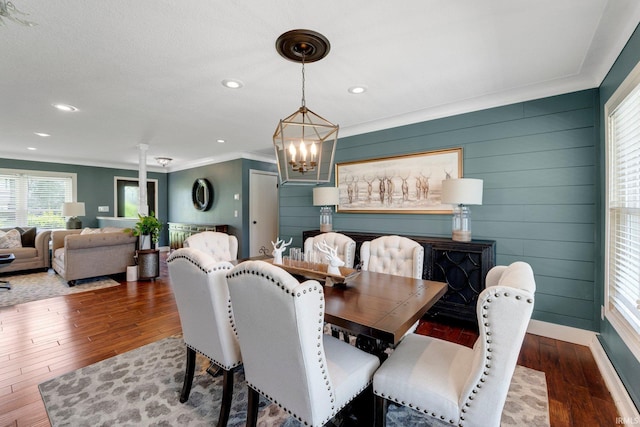 119 Southridge Dr, Fort Wayne, IN 46825 - dining area featuring crown molding, wood finished floors, baseboards, recessed lighting, and a chandelier