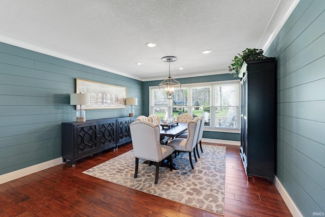 119 Southridge Dr, Fort Wayne, IN 46825 - dining room featuring an inviting chandelier, baseboards, dark wood finished floors, and a textured ceiling
