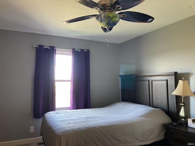 4530 E 700 N, Monterey, IN 46960 - bedroom with baseboards and ceiling fan