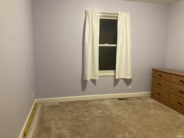 4530 E 700 N, Monterey, IN 46960 - unfurnished room featuring carpet floors, baseboards, and visible vents