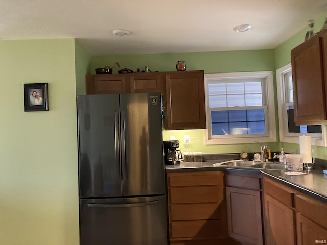 4530 E 700 N, Monterey, IN 46960 - kitchen featuring freestanding refrigerator, a sink, and dark countertops