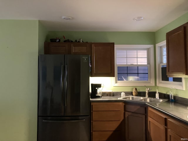 4530 E 700 N, Monterey, IN 46960 - kitchen with freestanding refrigerator, a sink, and dark countertops