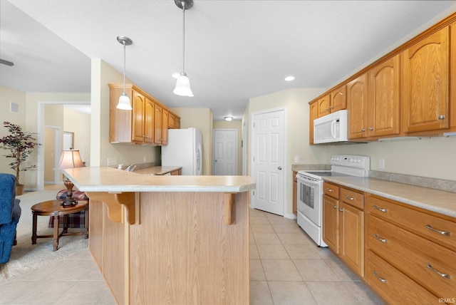 kitchen featuring white appliances, a peninsula, light tile patterned floors, and light countertops