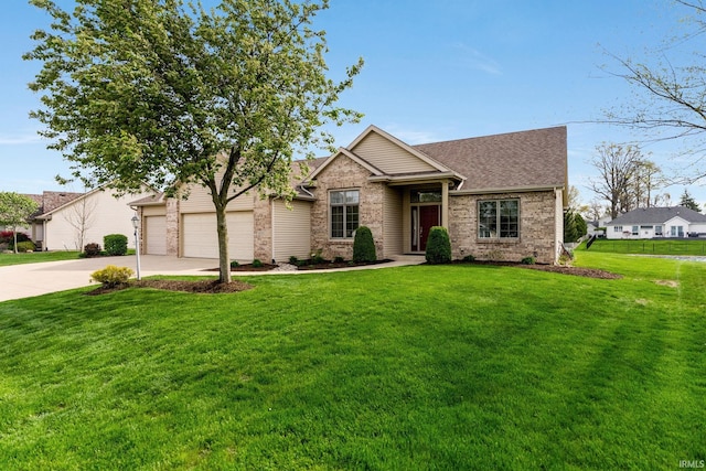 view of front of property with concrete driveway, brick siding, an attached garage, and a front lawn