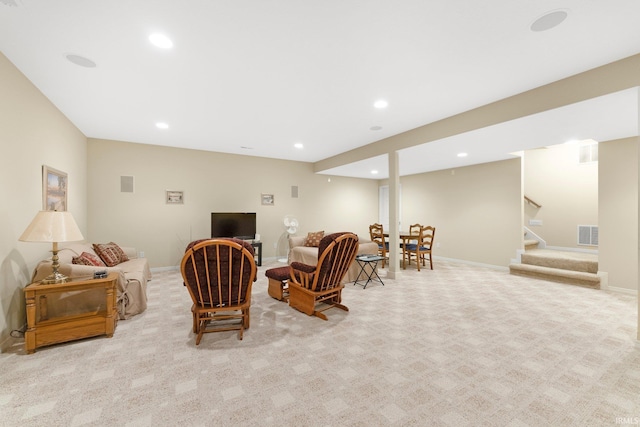 carpeted living area featuring recessed lighting, baseboards, visible vents, and stairway