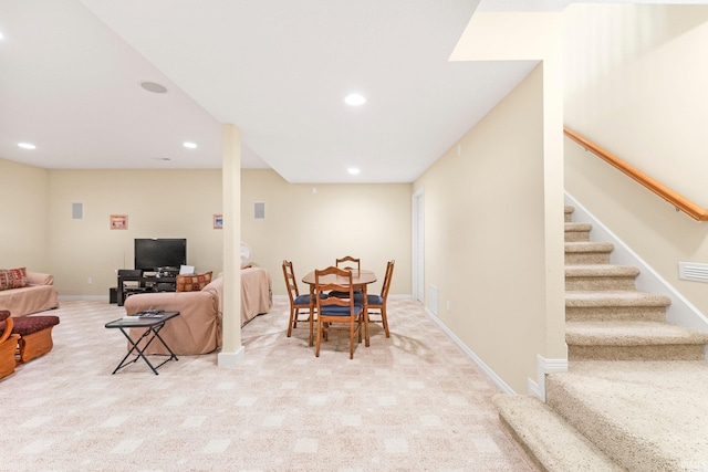 carpeted dining area featuring stairway, baseboards, and recessed lighting