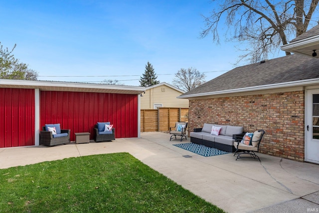 view of patio / terrace with fence and an outdoor hangout area