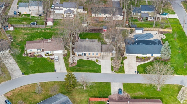 birds eye view of property with a residential view