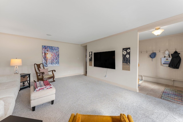 living room with crown molding, baseboards, and carpet