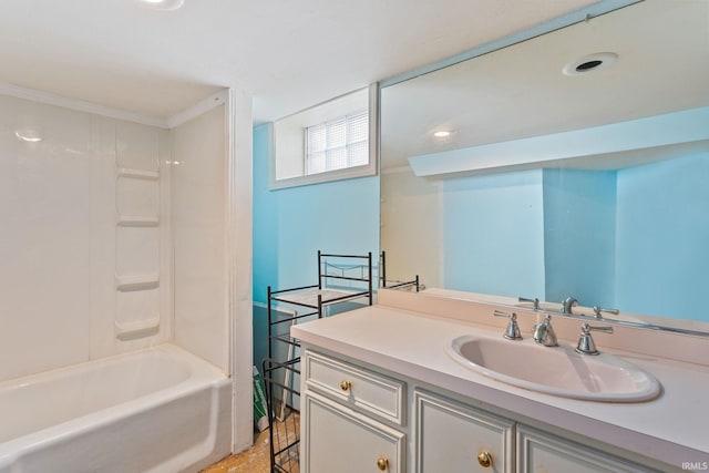 bathroom with recessed lighting, washtub / shower combination, and vanity