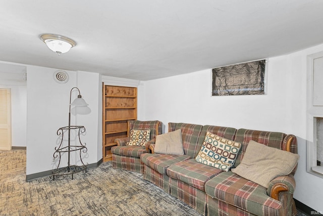 living room with carpet flooring and baseboards