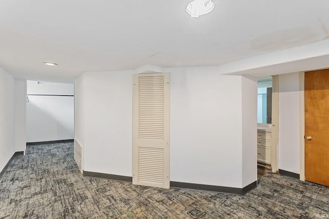 finished below grade area with baseboards and carpet
