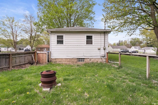 view of outdoor structure with a fenced backyard