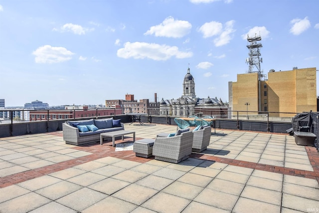 view of patio with a view of city and outdoor lounge area