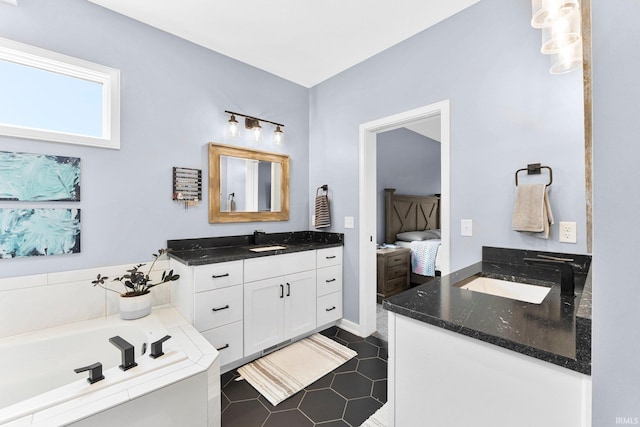 bathroom with tile patterned flooring, a sink, a garden tub, and two vanities