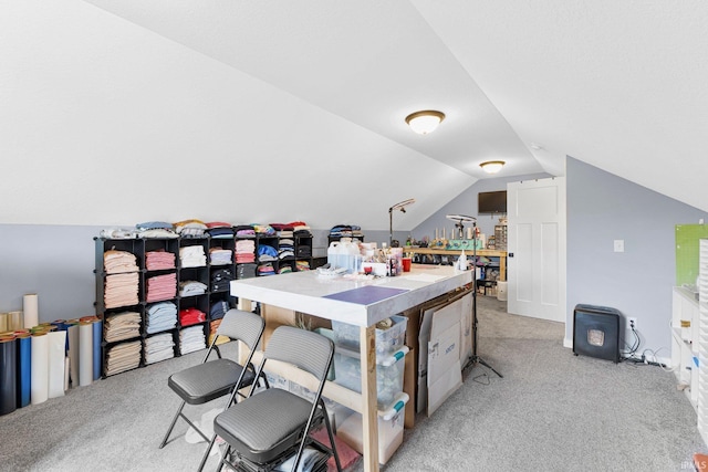office area with light colored carpet and lofted ceiling