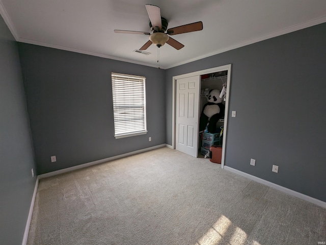 4090 Pinehurst Dr, Jasper, IN 47546 - unfurnished bedroom featuring carpet, crown molding, a closet, baseboards, and ceiling fan