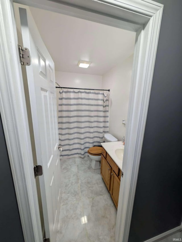 4090 Pinehurst Dr, Jasper, IN 47546 - bathroom with toilet, vanity, and a shower with shower curtain