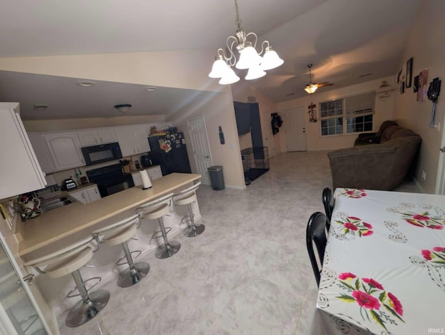 4090 Pinehurst Dr, Jasper, IN 47546 - dining area featuring ceiling fan, light flooring, vaulted ceiling, baseboards, and a chandelier