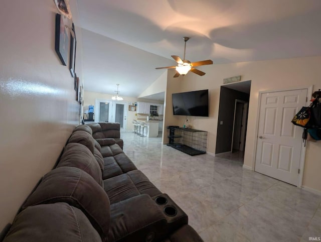 4090 Pinehurst Dr, Jasper, IN 47546 - living area with baseboards, a ceiling fan, and vaulted ceiling