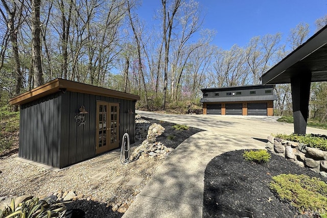 55960 County Road 23, Bristol, IN 46507 - view of side of property with french doors and an outdoor structure