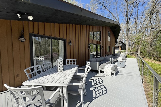 55960 County Road 23, Bristol, IN 46507 - wooden deck featuring outdoor lounge area and outdoor dining area