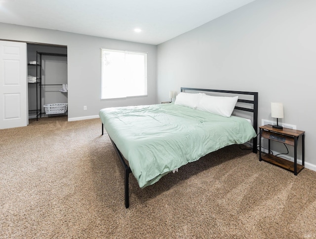 bedroom featuring baseboards, carpet flooring, and recessed lighting
