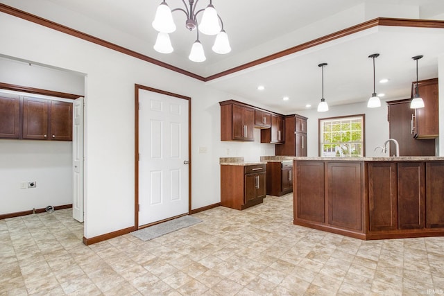 300 E Wabash Ave, Wakarusa, IN 46573 - kitchen with hanging light fixtures, baseboards, light stone counters, a peninsula, and a notable chandelier