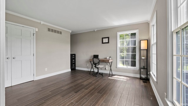office space with crown molding, baseboards, visible vents, and dark wood-type flooring