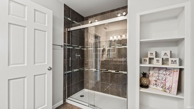 full bathroom featuring a shower stall