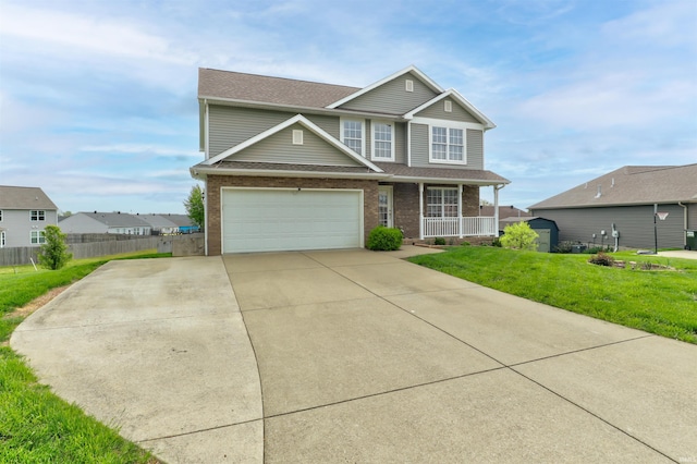 9633 Blyth Dr, Evansville, IN 47725 - craftsman-style home featuring brick siding, fence, covered porch, and driveway