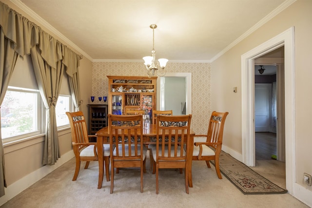 dining area featuring crown molding, light carpet, wallpapered walls, and a chandelier