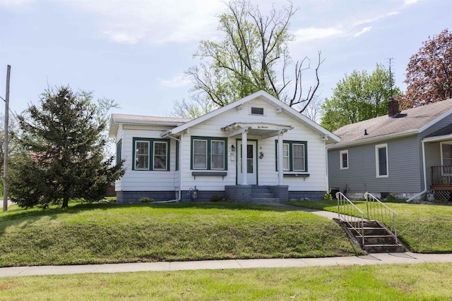 bungalow with a front lawn