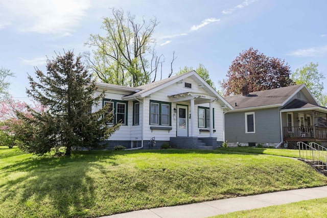view of front of property featuring a front yard