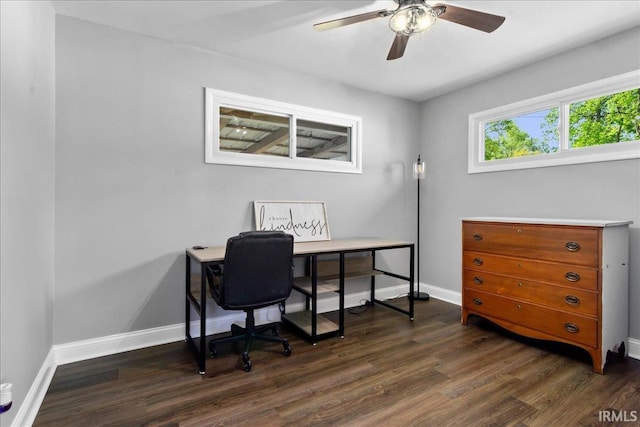 office space featuring baseboards, ceiling fan, and wood finished floors