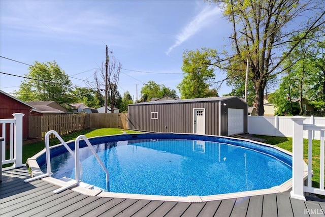 view of pool featuring a fenced backyard, a fenced in pool, and a wooden deck