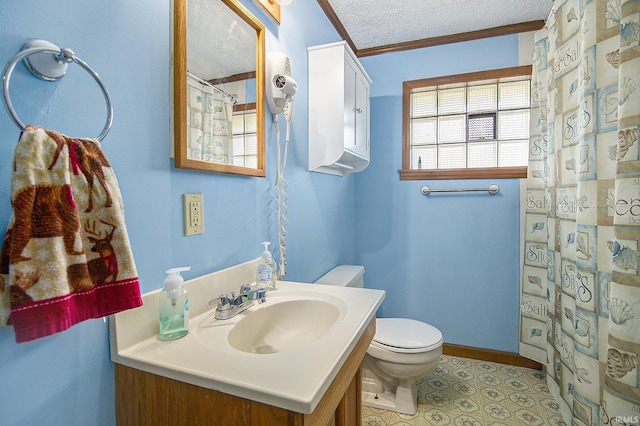 full bathroom with toilet, a textured ceiling, ornamental molding, and vanity