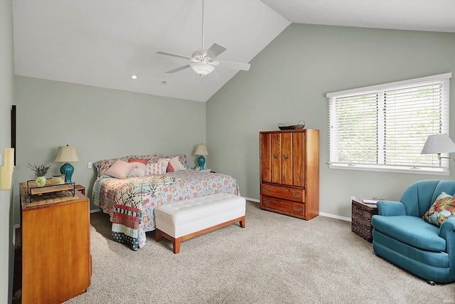 bedroom with baseboards, carpet flooring, ceiling fan, and vaulted ceiling