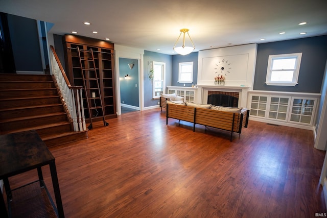 10220 6b Rd, Plymouth, IN 46563 - living room with healthy amount of natural light, stairway, wood finished floors, and recessed lighting