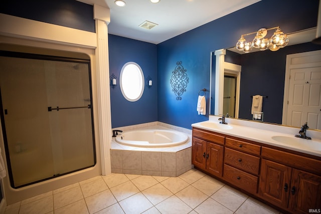 10220 6b Rd, Plymouth, IN 46563 - bathroom with tile patterned floors, a bath, a stall shower, double vanity, and recessed lighting