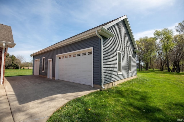 10220 6b Rd, Plymouth, IN 46563 - view of property exterior featuring a detached garage and a lawn