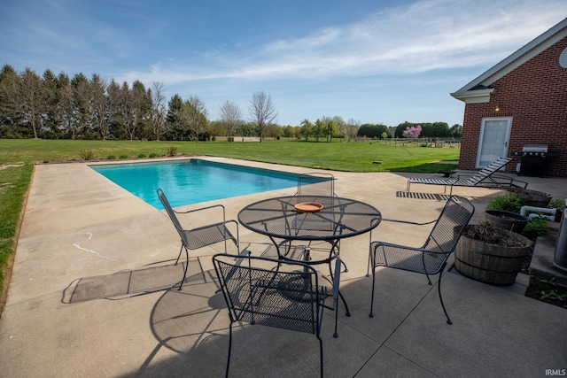 10220 6b Rd, Plymouth, IN 46563 - swimming pool with a lawn, a patio, and grilling area