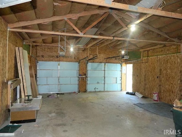 414 17th St, Bedford, IN 47421 - garage featuring a garage door opener
