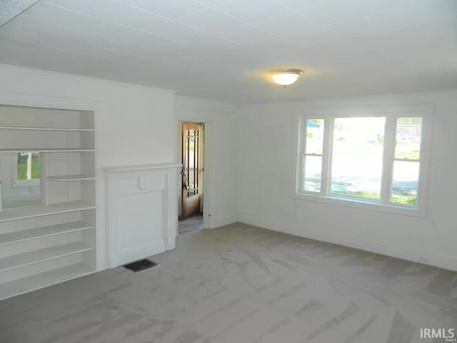 414 17th St, Bedford, IN 47421 - empty room with visible vents and light carpet
