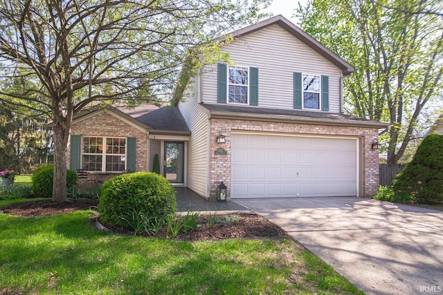 view of front facade with an attached garage, a front lawn, driveway, and brick siding