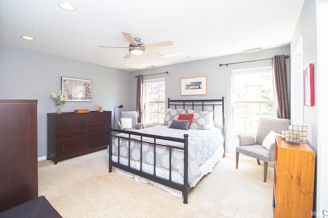 carpeted bedroom with baseboards, ceiling fan, recessed lighting, and visible vents