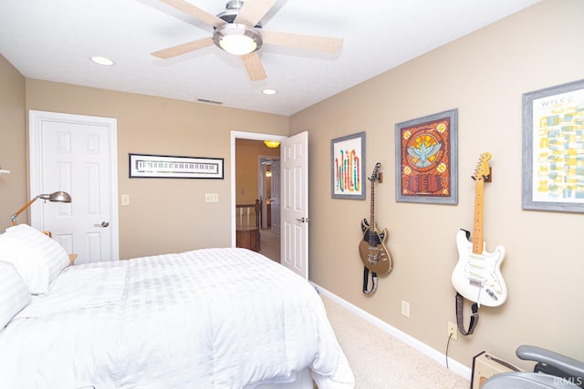 carpeted bedroom with baseboards, a ceiling fan, recessed lighting, and visible vents