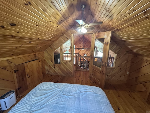 2340 W County Rd 550 S, Paoli, IN 47454 - bedroom featuring wood ceiling, wood-type flooring, vaulted ceiling, and wood walls